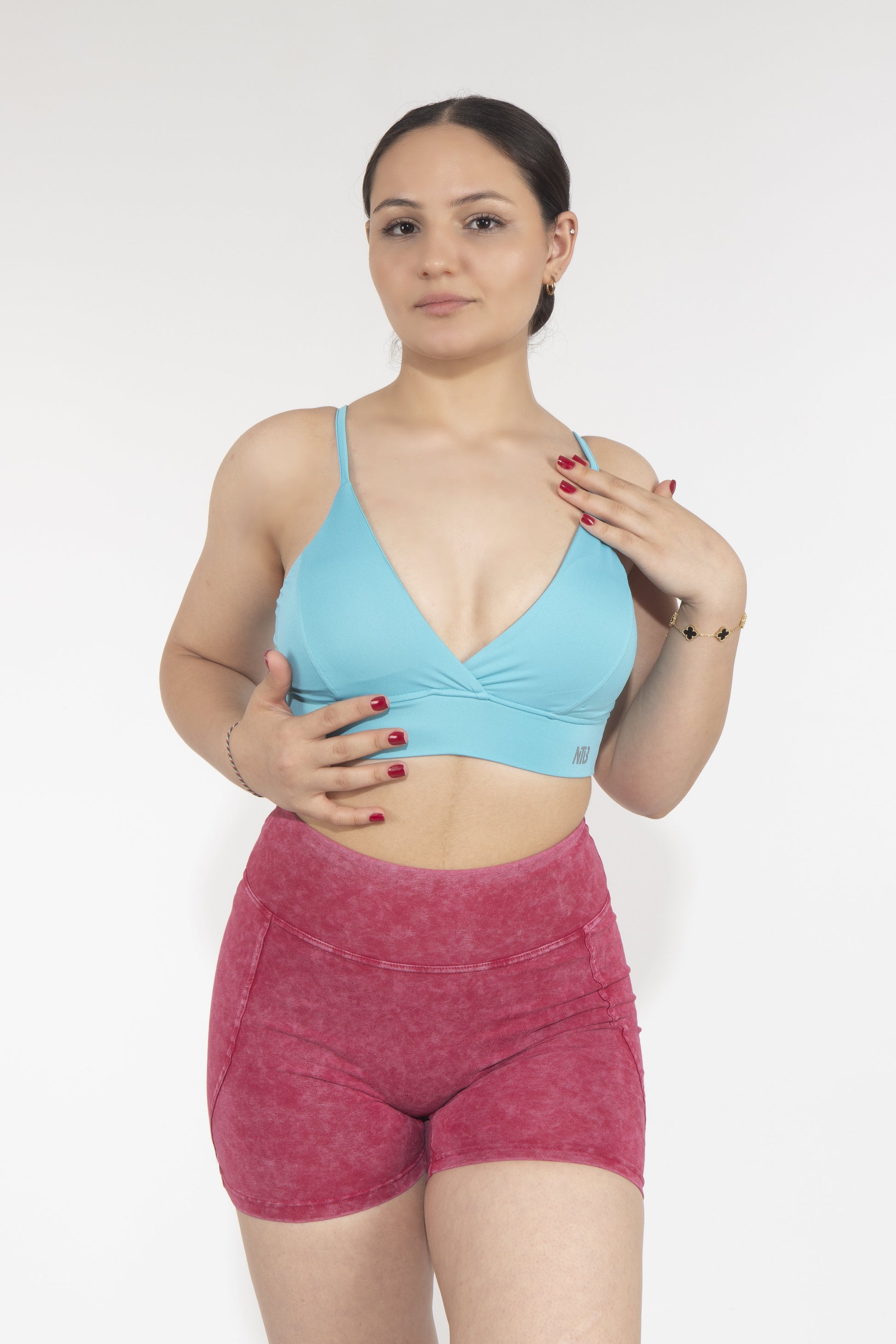 Genähter Sport-BH mit Ausschnitt in Türkis